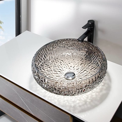 Il lavandino decorativo cromato del bagno lancia forma della palla intorno al lavandino di vetro d'argento della nave