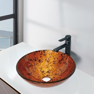 Il lavandino di vetro rotondo rosso del bagno ha strutturato il disegno esteriore della mano con la stagnola